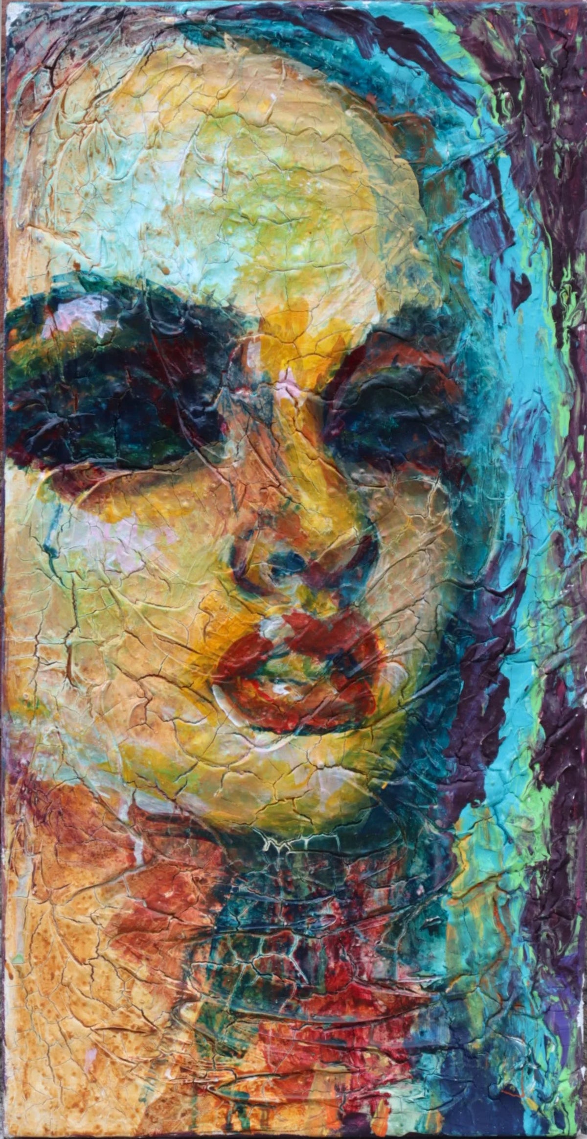 A narrow portrait with dark eyes and a cracked surface of yellow, blue and red paint.